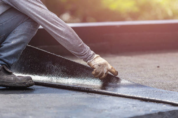Professional Exterior Waterproofing technician working in Brentwood, NY